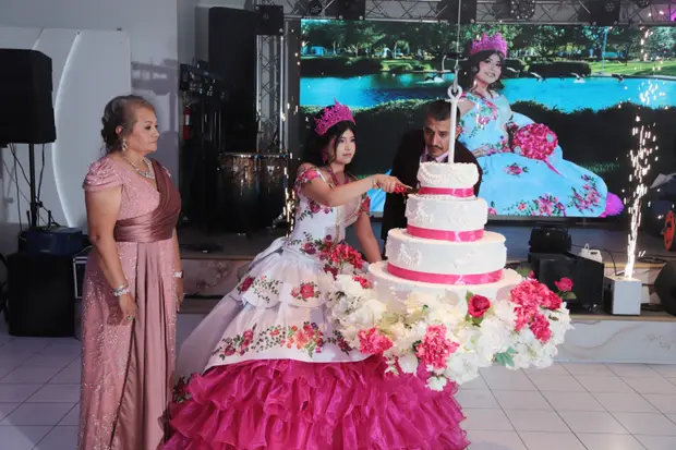 Wide quinceanera photography with warm event styling.